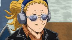 an anime character wearing headphones and looking to the side with long blonde hair in front of him