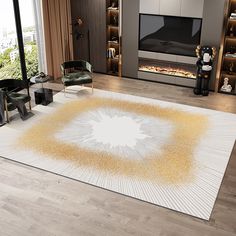 a living room with a large rug on the floor