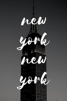 the words new york are written in white on a black and white background with a tall building behind it