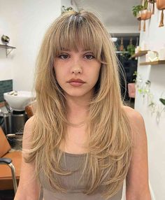 55 Best Layered Hair with Bangs for 2023 Dark Hair With Layers And Bangs, Long Hair Half Up Half Down With Bangs, Butterfly Haircut With Full Bangs, Long Layered Haircuts Shag, Long Choppy Layers With Bangs, Mid Length Hair With Fringe Bangs, Bangs And Medium Length Hair, 70’s Shag Haircut, Feather Layer Haircut