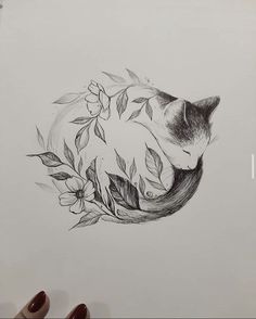 a drawing of a sleeping cat with flowers on it