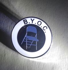 NAVY BLUE BYOC pin Known Quotes, Shirley Chisholm, A Seat At The Table, Orange Rainbow, Seat At The Table, Black Pins, At The Table, Folding Chair, Your Voice