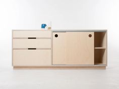 the sideboard has two drawers and is made from plywood veneere wood