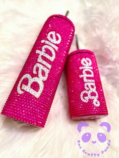two pink sparkle lip bales with the words dance on them