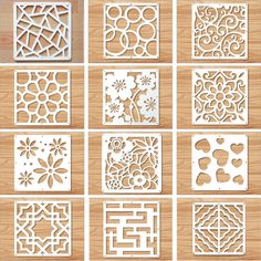 laser cutout designs for decorative wall hangings and doors, including the design in white