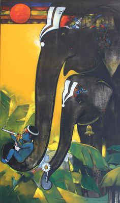 an elephant with a man riding on it's back