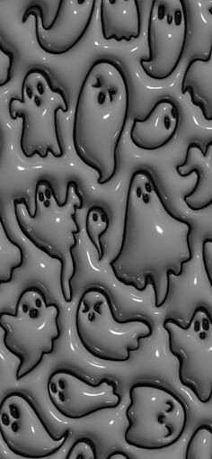 a group of ghost like objects in grey and black colors, all grouped together to form an abstract pattern