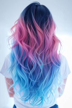 Enhance your natural beauty with these beautiful long ombre cuts. Perfect for adding a pop of color and sophistication to your style. Follow the link to discover all the stunning hair ideas that will dominate in 2024! Pink To Blue Ombre Hair, Pink Blue Ombre Hair, Bright Color Hair Ideas, Purple To Pink Ombre Hair, Ombre Hair Color For Blondes, Vibrant Ombre Hair, Rainbow Prism Hair, Hair Rainbow Color, Prism Hair Color