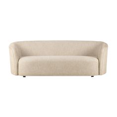 a beige couch sitting on top of a white floor