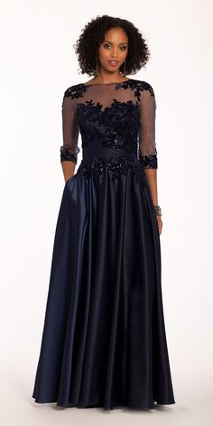 Feel like magic in this beauteous mother of the bride dress: featuring a jewel neckline, three-quarter sleeves, A-line skirt and keyhole back, this velvet and satin long evening dress is the perfect winter wedding staple. Accessorize with low rhinestone heels and a glitter clutch to add some sparkle. #CamilleLaVie Velvet Flower, Glitter Clutch, Velvet Flowers, Rhinestone Heels, Jewel Neckline