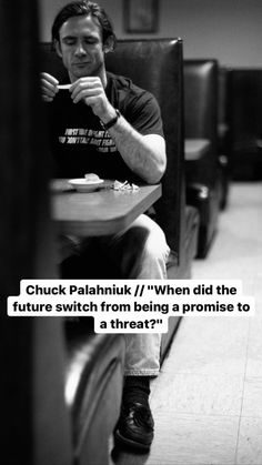 a man sitting at a table with his hand in his mouth and the words chuck raahnikk / when did the future switch from being a promise to a threat?