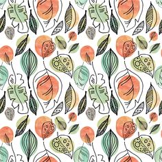 an orange and green pattern on a white background with leaves, flowers and circles in the center
