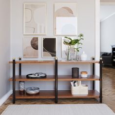 a living room with art on the wall