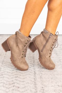 These sassy taupe boots are made for fun days at the pumpkin patch! These lovely shoes go with everything from flirty fall midi dresses to jeans and a cozy sweater. We love the lace up style and the unique taupe suede-like exterior is sure to stand out from the crowd! Made of all man made materials. Dry sponge clean. Colors will vary from different devices. If you are returning a pair of shoes: Shoe boxes must be encased in another box for shipping to protect the items. If you send shoes back wi Fall Booties Outfit, Trendy Winter Shoes, Brown Booties Outfit, Cute Fall Boots, Fall Midi, Midi Dress Fall, Platform Combat Boots, Taupe Boots, Booties Outfit