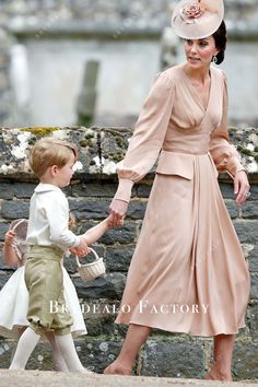 an older woman holding the hand of a young boy