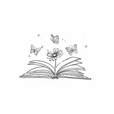 an open book with butterflies flying out of it