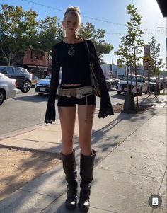 Brooklyn Concert Outfit, Layered Shorts Outfit, All Black Pool Party Outfit, Nyc High Fashion, Ysabelle Wallace Outfits, Brown Boots Outfit Y2k, Jean Skirt Black Boots, Rocky Brown Distressed Boots Outfits, Chic Rave Outfits