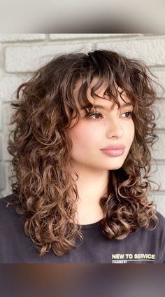 Layered Lob Haircut Curly Hair, Cute Haircut Curly Hair, Long Wavy Layers With Bangs, Shaggy Curly Hair Round Face, Naturally Wavy Hair Updo, Heavy Bangs Curly Hair, Modern Shag Haircut Curly Hair, Hairstyles For Women With Curly Hair, Curly Shag Haircut Fine Hair