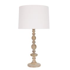 a wooden lamp with a white shade on it