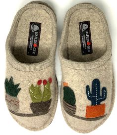 From HAFLINGER&#x2C; the Cactus Appliqued Wool Mule Slippers feature:Soft&#x2C; boiled-wool upper massages the foot for all-day comfortArtisan cactus appliquesSlip-on constructionWool liningLatex coated felt wool outsole is both comfortable and flexibleGrip dots on the sole help you keep your footingFlat heelImported. Mule Slippers For Women, Slippers Aesthetic, Cold Weather Shoes, Mountain Mama, Funky Shoes, Felt Wool, Wool Slippers, Boiled Wool, Jewelry Outfit