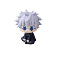 an anime figurine is sitting on the ground with blue eyes and white hair