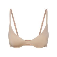 Boost your bust and maximize your cleavage in this comfortable, wireless plunge super push-up bra that adds one cup size and provides a supportive lift. Features fully adjustable straps, foam pads, wide microfiber wings for smoothing, a tonal silicone SKIMS logo at the front wing, and a hook and eye back closure. Fits true to size. | SKIMS Super Push-Up Bra | Light Neutral | 34B | Wireless Form Club Dresses, College Wardrobe, Super Push Up, Xmas Ideas, Wireless Bra, Demi Bra, T Shirt Bra, Cup Size, Beach Girl