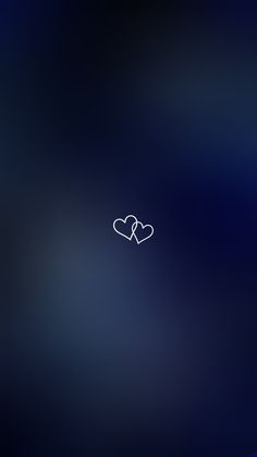 two hearts on a dark blue background
