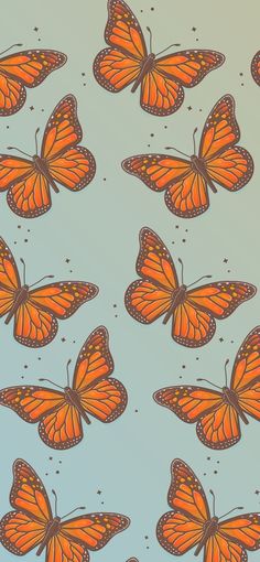many orange butterflies are flying in the air on a purple and blue background with bubbles