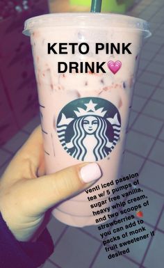 a person holding up a pink drink with the words keto pink in front of it