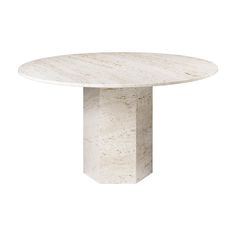 a white marble table with an octagonal base