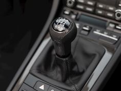 the interior of a car with an automatic gear stick