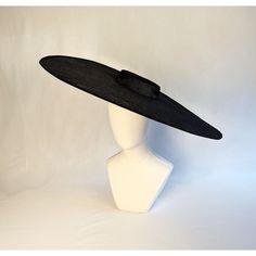 "One very wide straw hatinator base made of two layers of stiffened black sinamay that measures approximately 23.5\" (59.7cm) in diameter. It is a round shape with a flat crown that measures 5.5\" (14cm) across and 1.25\" (3cm) high.  The edges of the brim are finished in wired sinamay. PLEASE NOTE: This is NOT a ready to wear finished hat and will not stay on your head unless you add a head band or elastic to wear - these are sold separately in my shop. Add embellishments of your choice. A striking hat base! Lots of hat bases and millinery supplies listed in my shop   www.etsy.com/shop/apinkswan  ! Thanks for looking - feel free to convo me with any questions you may have." Diy Derby Hat, Hat Form, Blank Hats, Millinery Supplies, Sinamay Hats, Hat Base, Guys And Dolls, Derby Hat, Love Hat