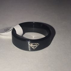 Superman Emblem In Black 8mm Thick Ring. New Superman, Superman Emblem, Superman Ring, Thick Ring, Mens Accessories Jewelry, Mens Accessories, Color Black, Man Shop, Stainless Steel