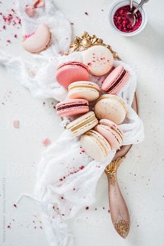 macaroons and other pastries on a white cloth