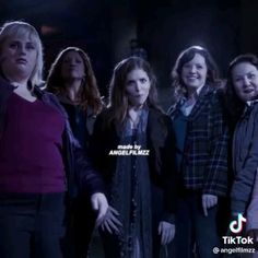 a group of women standing next to each other in front of a dark background with the words angel files written on it