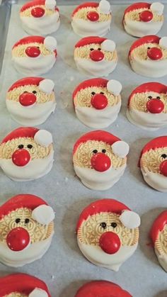 cupcakes decorated like santa claus are ready to be baked in the oven for christmas