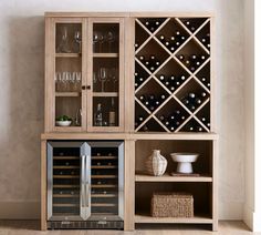 a wooden cabinet with wine bottles and glasses