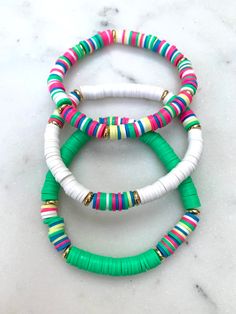 One for $12. Three for $30 Clay Bracelet Sets, Bracelets Beachy, Leo Club, Bracelet Heishi, Bracelets Heishi, Heishi Jewelry, Beachy Bracelets, Preppy Bracelets