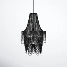 a black chandelier hanging from a ceiling