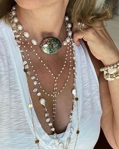 This exquisite necklace is crafted with a beautiful abalone nugget, an iridescent rainbow sea gem. Wear this timeless piece of jewelry to add a subtle, yet eye-catching sparkle to any outfit. Length 15-16" Abalone Shell is said to enhance feelings of peace, compassion and love. The power of abalone shells is found to be influenced by the power of Poseidon, the God of the Sea. All chakras Pearls are said to bring inner wisdom and help to strengthen and nurture the growth of love. In the Roman Emp Abalone Jewelry, Abalone Necklace, Layered Pearl Necklace, Layering Necklaces, Inner Wisdom, Necklace Layering, Pearl Necklaces, Necklace Pearl, Necklace Necklace