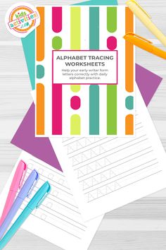 the alphabet practice worksheet is on top of some paper with pens and pencils