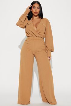 Available In Mocha And Light Blue. Pant Set Long Sleeve Top Collar Surplice Neckline Two Front Pockets Wide Leg Pant Elastic Waistband Non-Stretch Inseam: 33" Self: 100% Polyester Imported | Sweet Angel Pant Set in Mocha size 1X by Fashion Nova Jumpsuit Elegant Chic Classy Plus Size, Shades Of Melanin Outfits, Beige Wide Pants Outfit Summer, Shades Of Brown Outfits For Black Women, Modest Outfits For Big Bust, Beige Outfit Plus Size, Outfit For Curvy Ladies, Cute Outfits For Mid Size Women, Cream And Brown Outfits