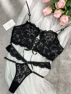 In black hue, crafted from soft lace fabric, this lingerie ensemble is adorned with delicate pearl flower patches, exuding both cuteness and allure. Its playful charm effortlessly blends with its innate sensuality, creating a captivating allure. 💙🌸✨ Material: Made of 95% nylon, 5% cotton. Exquisite Embroidery Design: The lingerie set features intricate embroidery, adding delicate patterns for an alluring appeal. Comfortable and Form-Fitting: Lightweight Padded-free Underwire Bra. Crafted from Mariana, Black Lace Lingerie, Black Pearls, Alternative Style, Lingerie Sets, Lingerie Panties, Intricate Embroidery, Flower Lace, Lace Lingerie Set