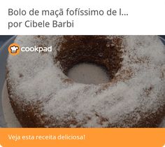 a donut covered in powdered sugar sitting on top of a cake plate with the words booo de maca fofissimo de i por ciele barbi