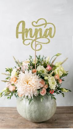 a cake topper that says candles 30th with flowers and greenery in the center