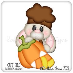 a cartoon bunny holding a pumpkin with the word cut file included