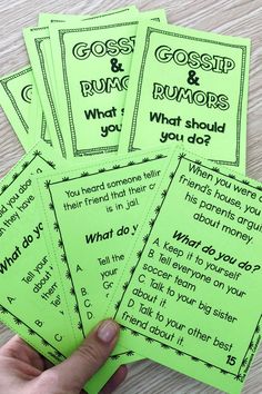 four green cards with the words, what should you do? and an image of a hand pointing at them