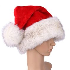 a white and red santa hat on top of a mannequin head