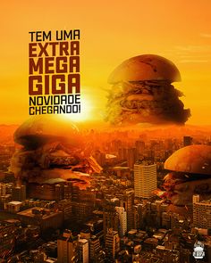 an advertisement for a burger restaurant in the middle of a city with two hamburgers stacked on top of each other