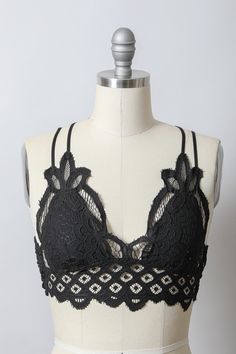 The Silvia Padded Crochet Lace Bralette Brami is sure to elevate your look with its stunning design. It features beautiful crochet detailing, adjustable straps, and removable padding for ultimate comfort. Enhance your wardrobe with this piece of fashionable, functional lingerie! Padded Adjustable Straps 60% Nylon 40% Cotton Size Guide: S: 32B 32C 34A 34B M: 32D 34C 36A 36B L: 32DD 34D 36C 38A 38B Machine Wash Delicate - Hang Dry Paper Lace, Instagram Help, Black Lace Bralette, Rose Boutique, Soft Floral, Black Bralette, Beautiful Crochet, Lace Bralette, Long A Line